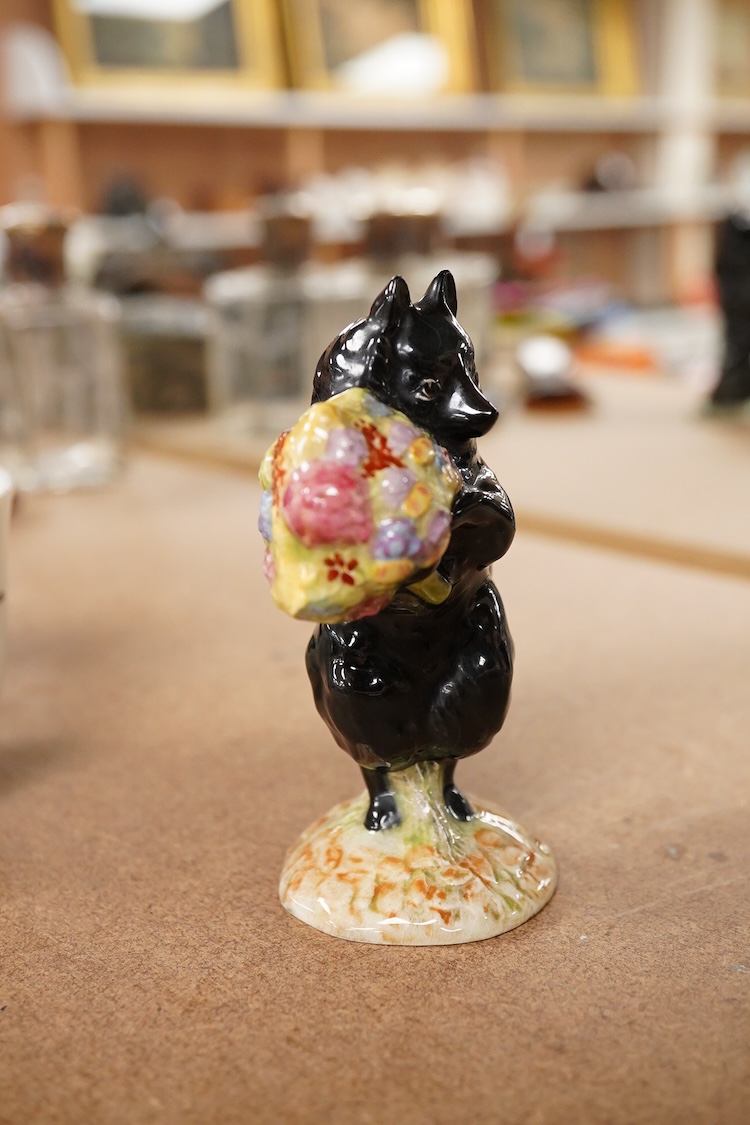 A Beatrix Potter F Warne and Co Ltd, Beswick figure of “Duchess” with flowers, gold stamp to base. 10cm high